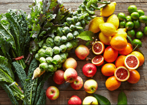 a group of fruits and vegetables on a wood surface Healthy Weight Loss Diets Newark